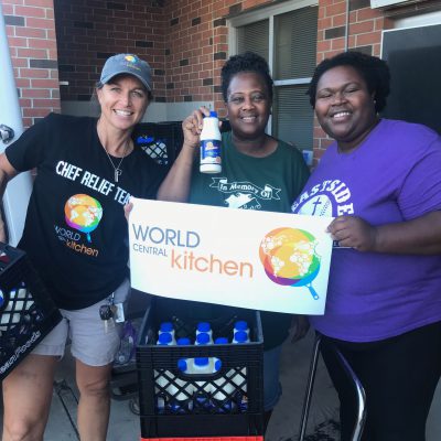 World Central Kitchen unloads the delivery of Borden milk at a shelter where 800 evacuees are being housed.